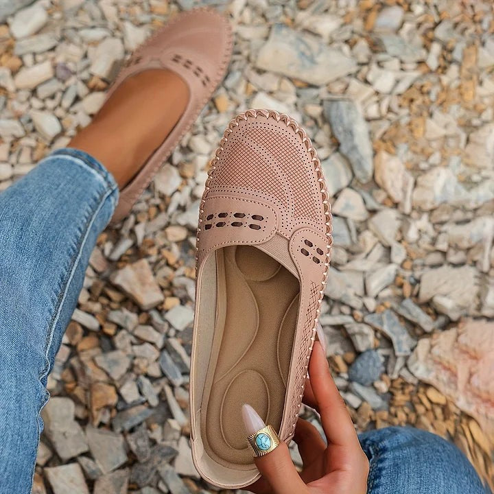 blush pink perforated flats with scalloped edge and cutout side detail