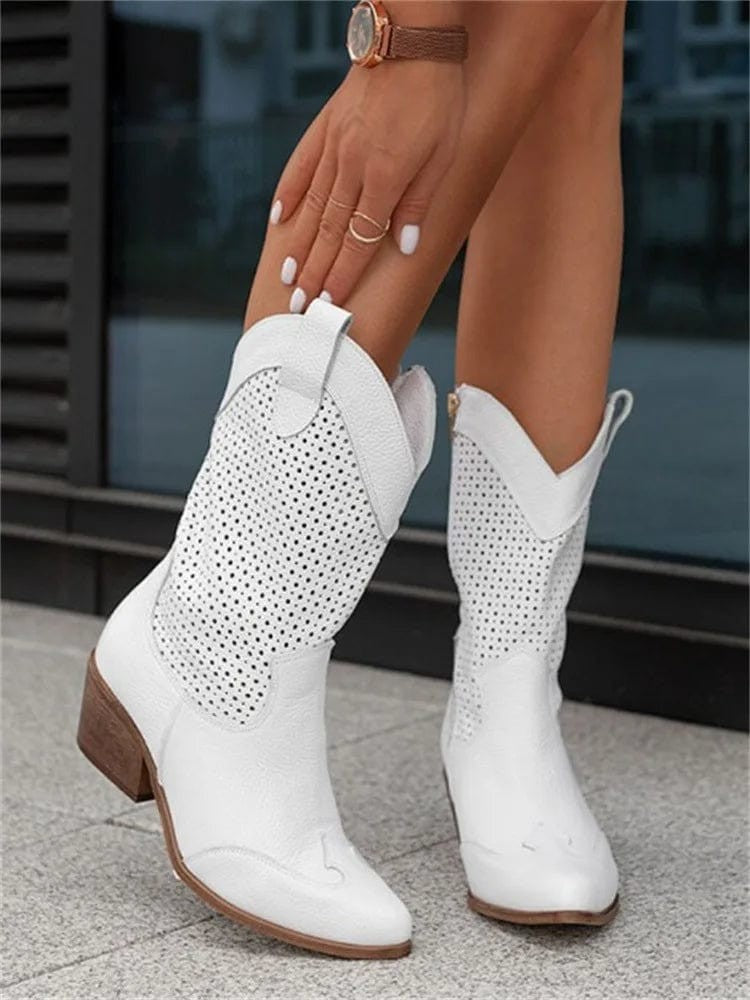 white leather cowboy boots with pointed toe and stacked heel