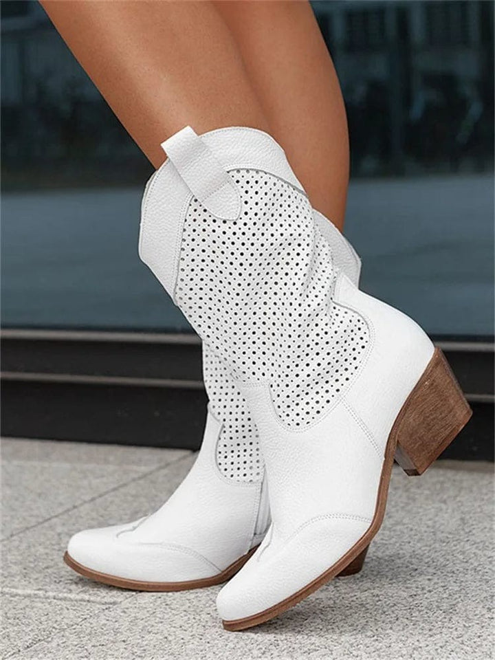 white leather perforated cowboy boots with wooden stacked heel