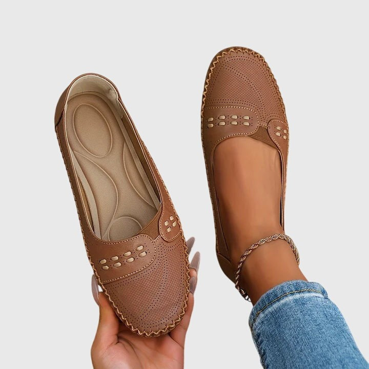 Camel brown leather loafers with cutout detail and stitched edges