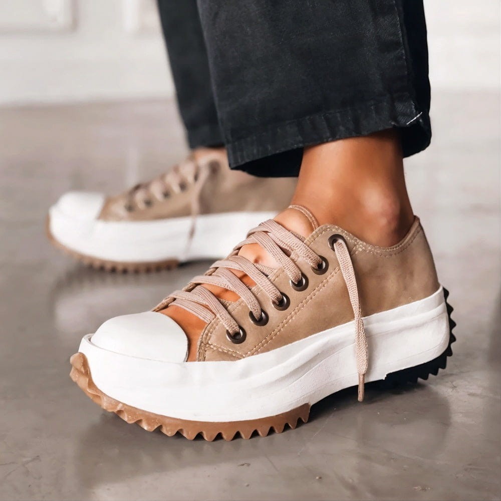 Tan suede platform sneakers with white cap toe and gum tread sole