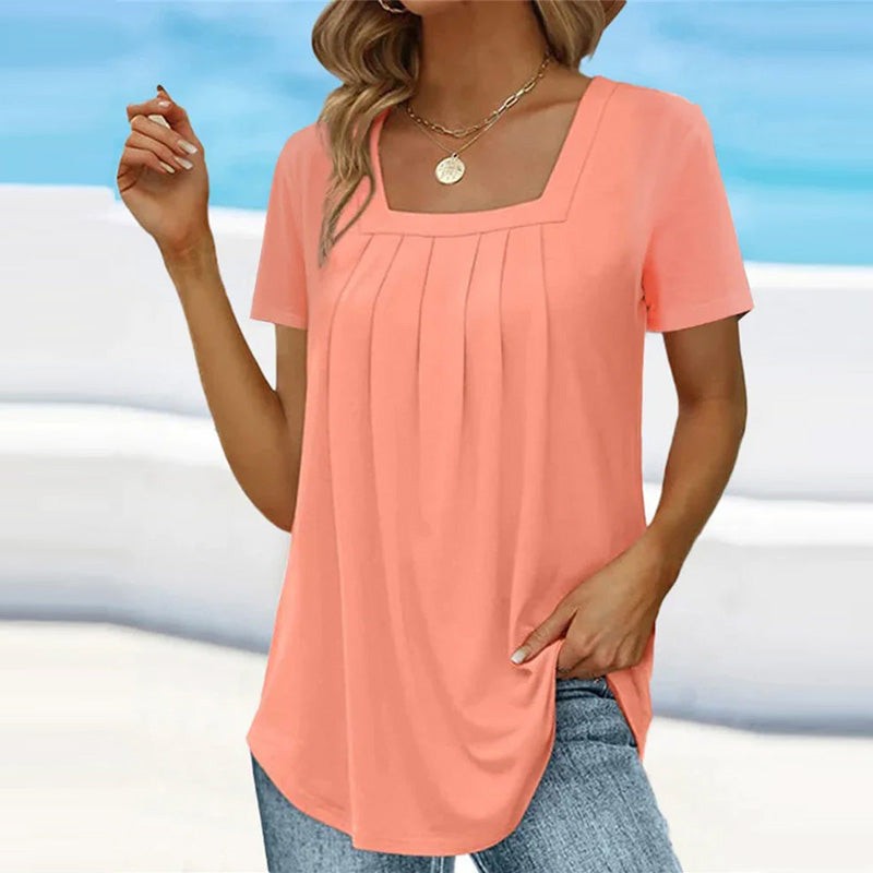 Coral pleated square-neck blouse paired with denim jeans