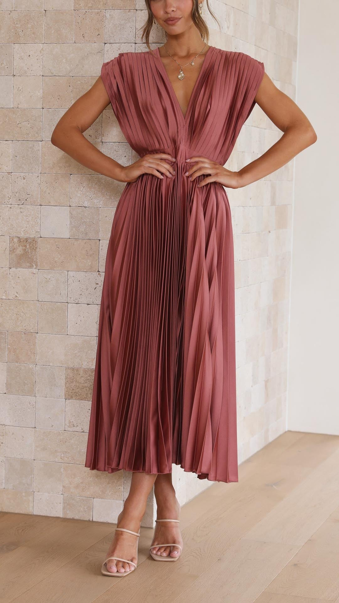 Rust pink pleated satin midi dress with plunging V-neck and cap sleeves