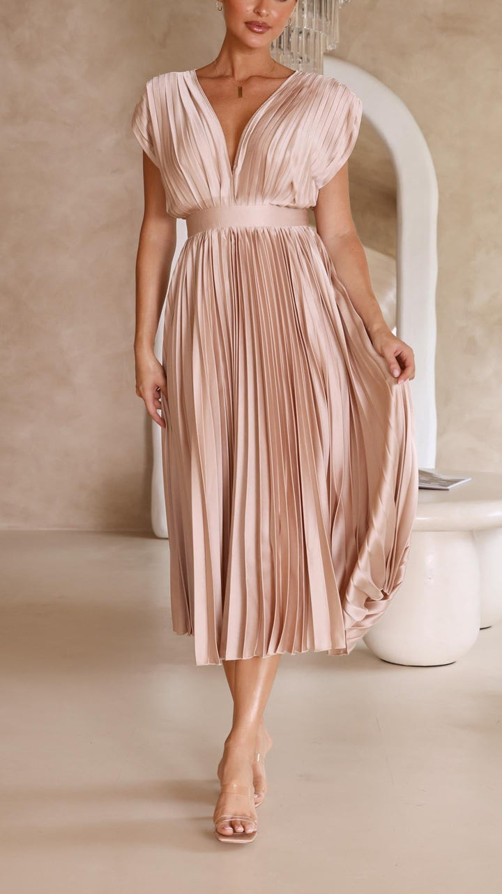 Blush pink pleated satin midi dress with deep V-neck and fitted waist