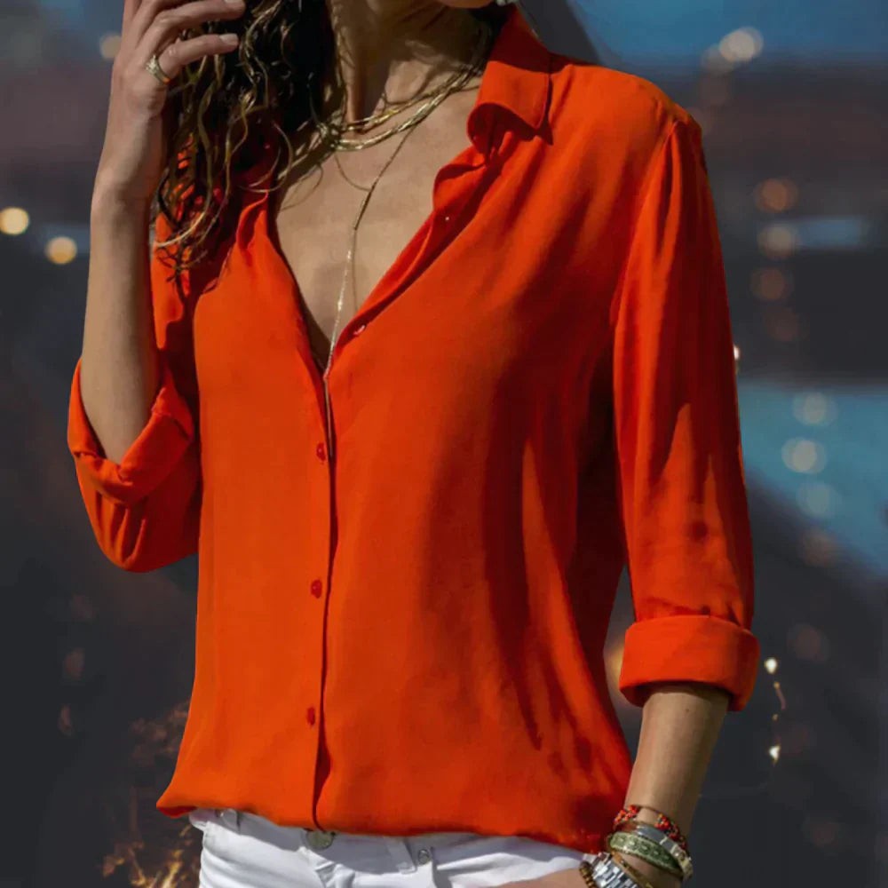 Orange satin button-down blouse with rolled long sleeves and collar