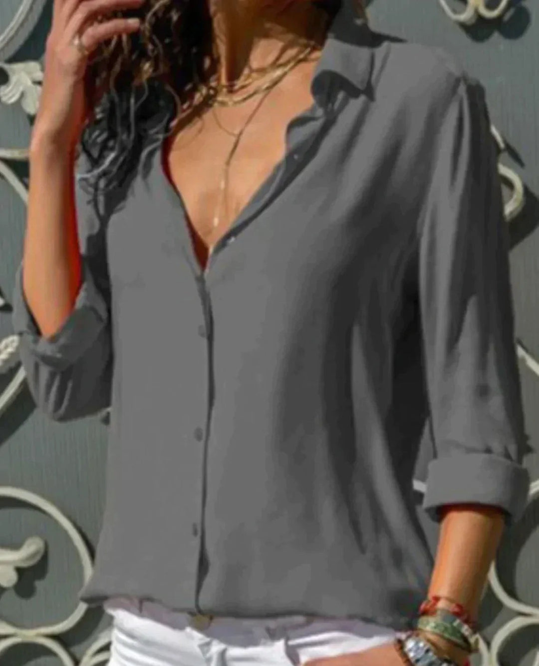 Gray satin button-down blouse with V-neck and long sleeves
