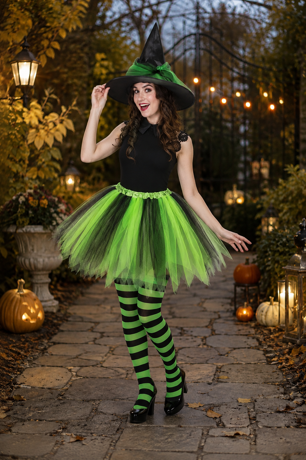 green and black witch costume with tulle tutu skirt and striped tights
