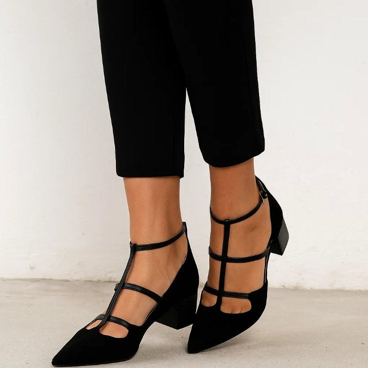 Black strappy ankle-strap low block heel pumps styled with cropped trousers
