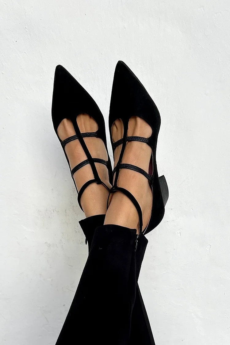 Black strappy heels with pointed toe and caged ankle straps