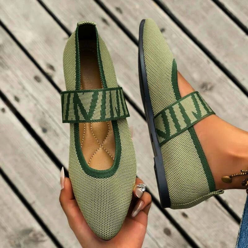 Sage green knit Mary Jane flats with zebra-print strap and pointed toe