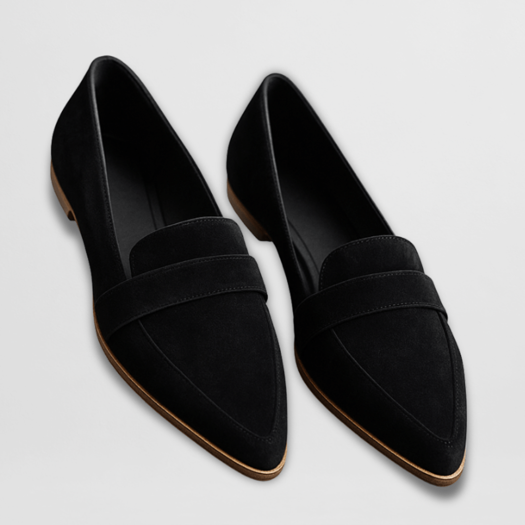 Black suede pointed-toe loafers with penny strap and stitched leather sole