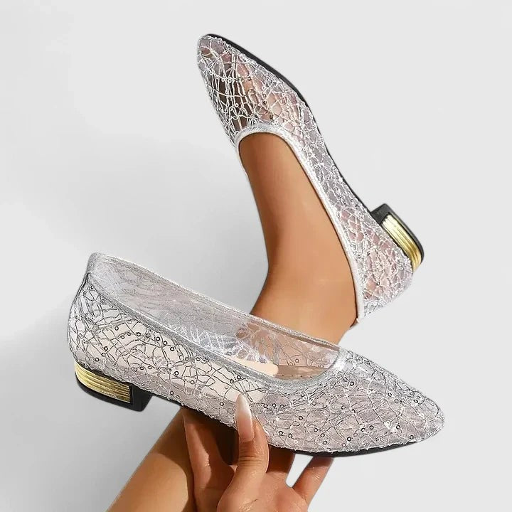 silver sequin lace flats displayed with gold heel trim