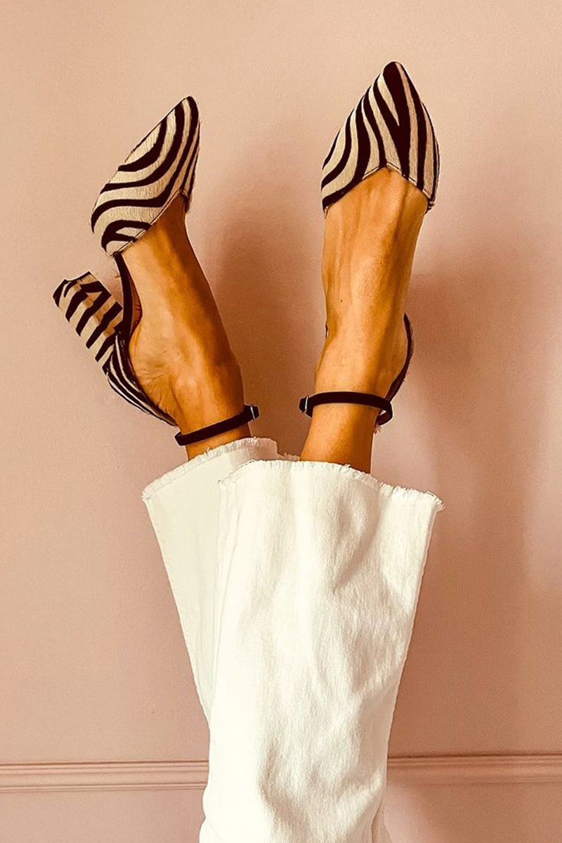 Pointed-toe zebra print sandals with ankle strap and stable heel