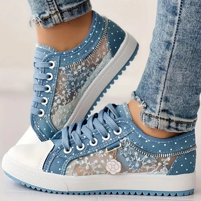 Light blue polka dot canvas sneakers with lace mesh panel and flower charm