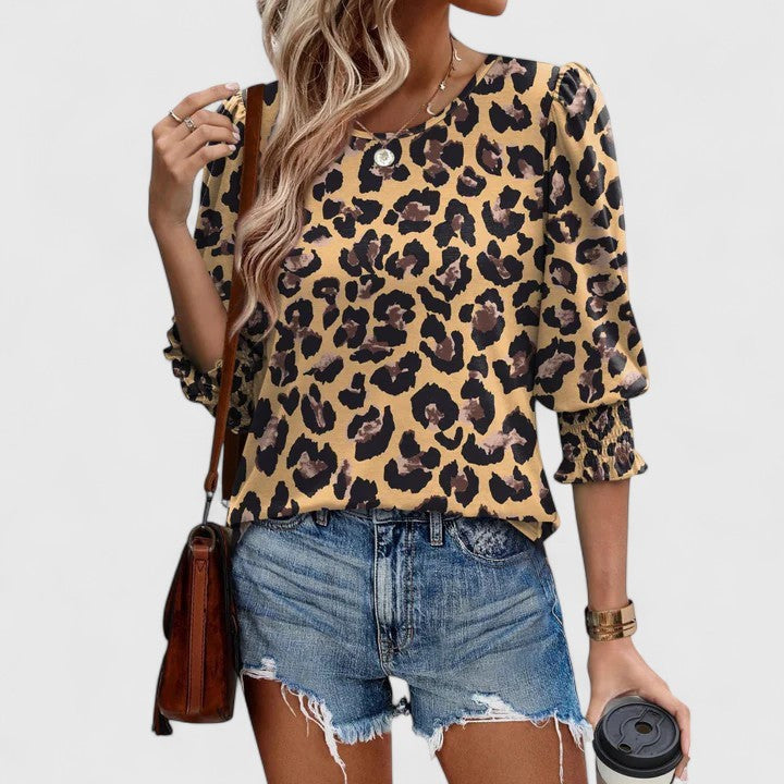 leopard print blouse with puff sleeves and smocked cuffs