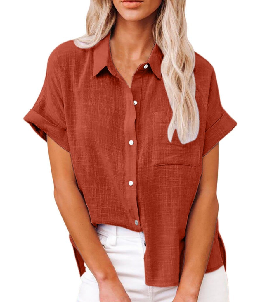Rust orange button-front blouse with collared neckline and front pocket