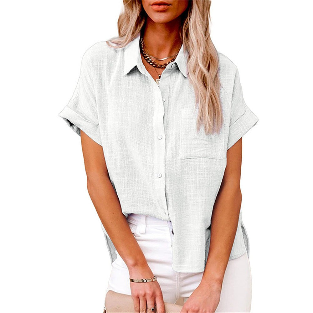 White button-down linen shirt with front pocket and high-low hem