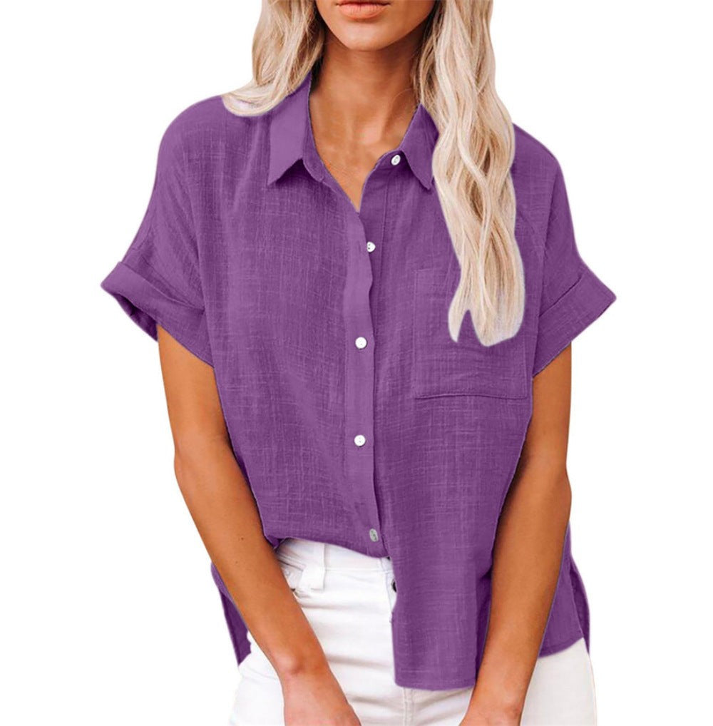 Purple collared blouse with front pocket and short cuffed sleeves