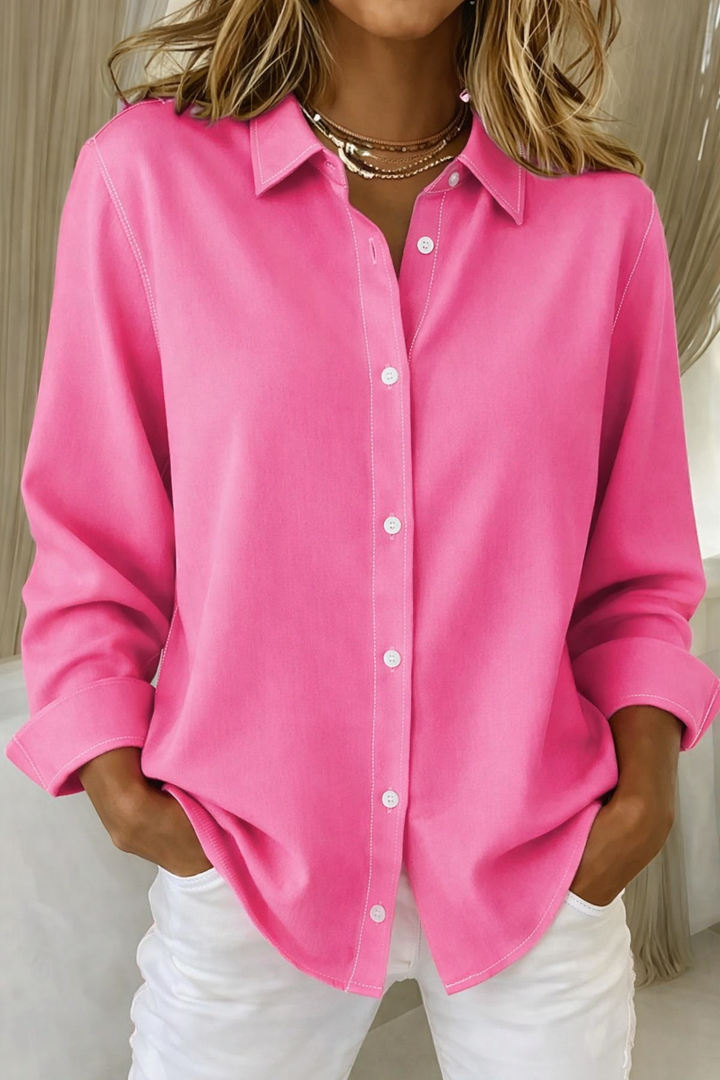 Hot pink button-down blouse with contrast stitching and collared neckline