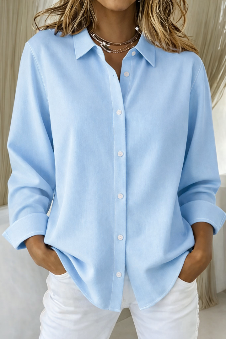 Light blue button-down shirt with point collar and rolled cuffs