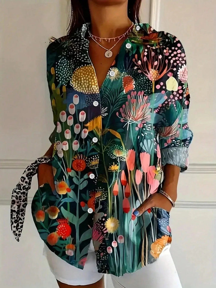 floral print blouse with lush botanical garden design in teal