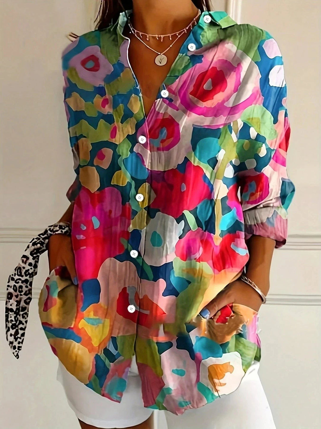 oversized shirt with bold multicolor abstract rose pattern