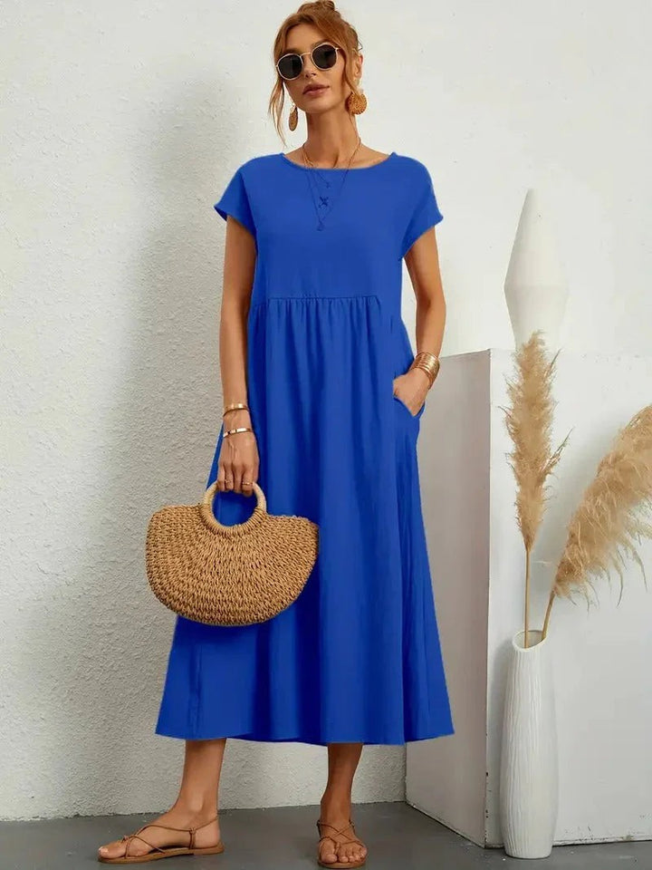 Cobalt blue smock dress with cap sleeves and relaxed A-line skirt