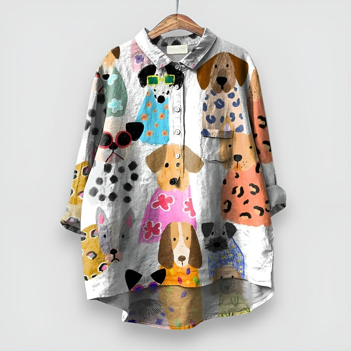 White button-down shirt featuring painted dog portraits and animal-print accents