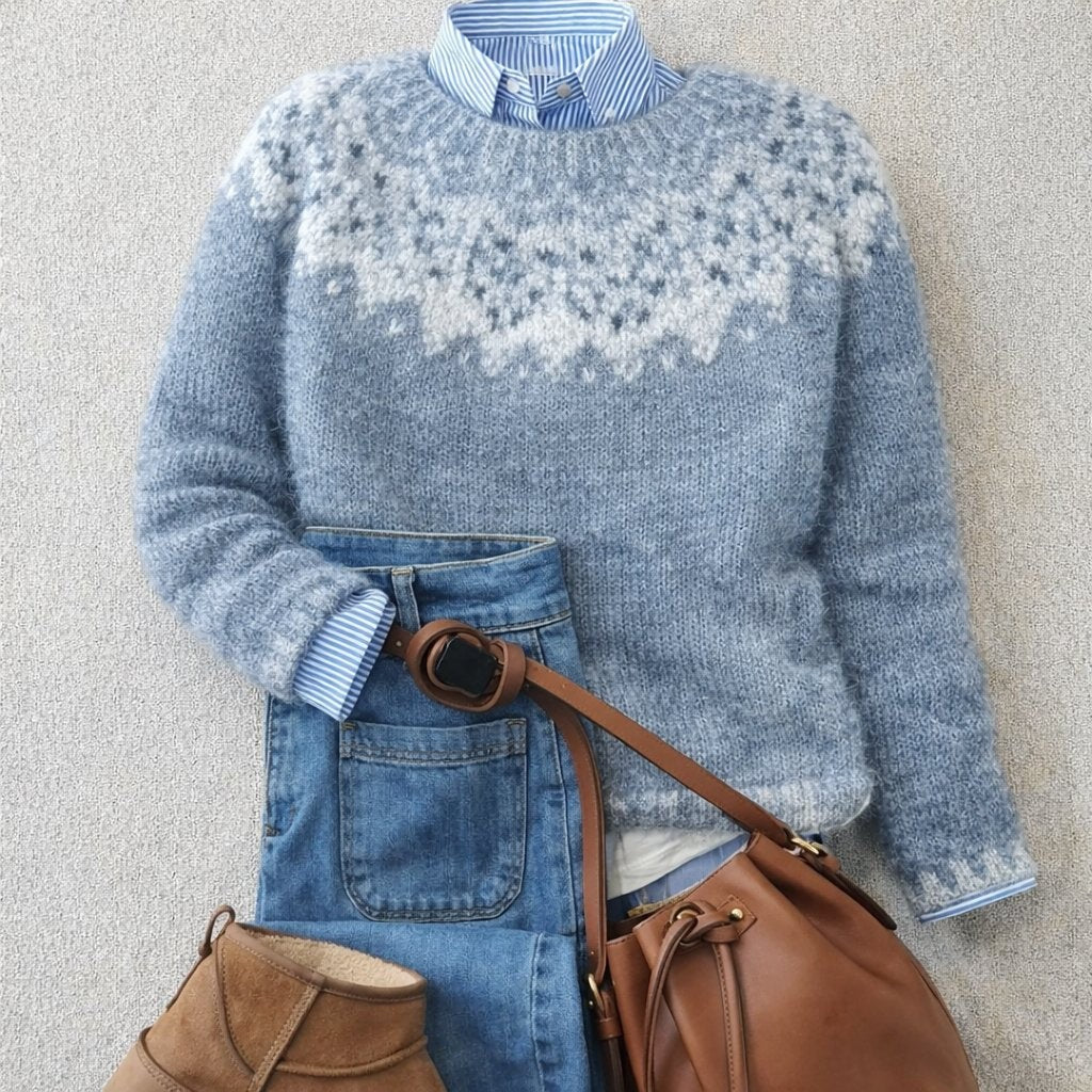 Blue Fair Isle knit crewneck sweater styled with denim jeans and a striped shirt