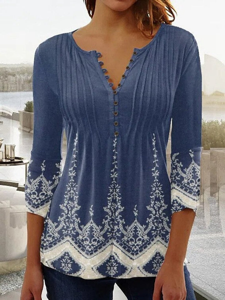 Blue henley blouse with white paisley border print and bell sleeves