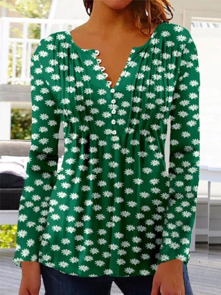 Green floral print henley blouse with long sleeves and button front