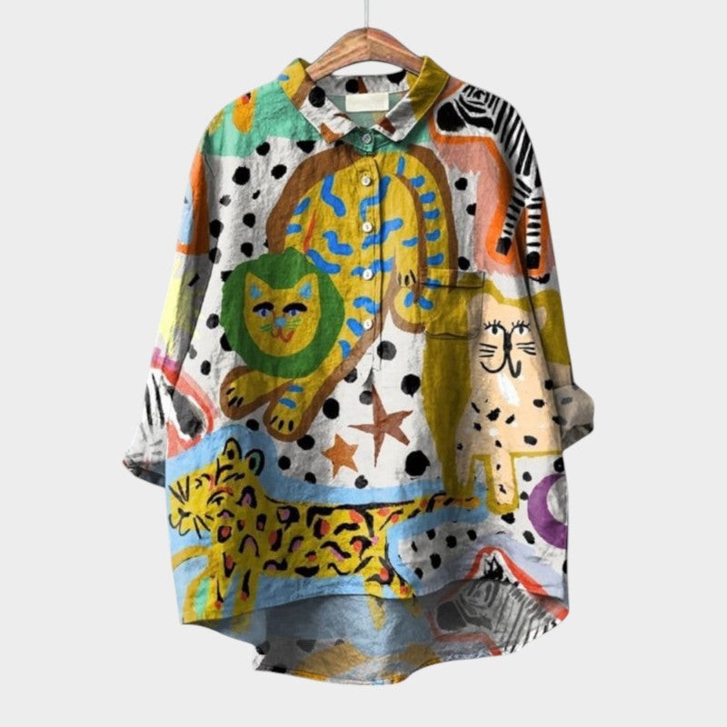 Multicolor high-low blouse with playful cat and zebra graphic print design