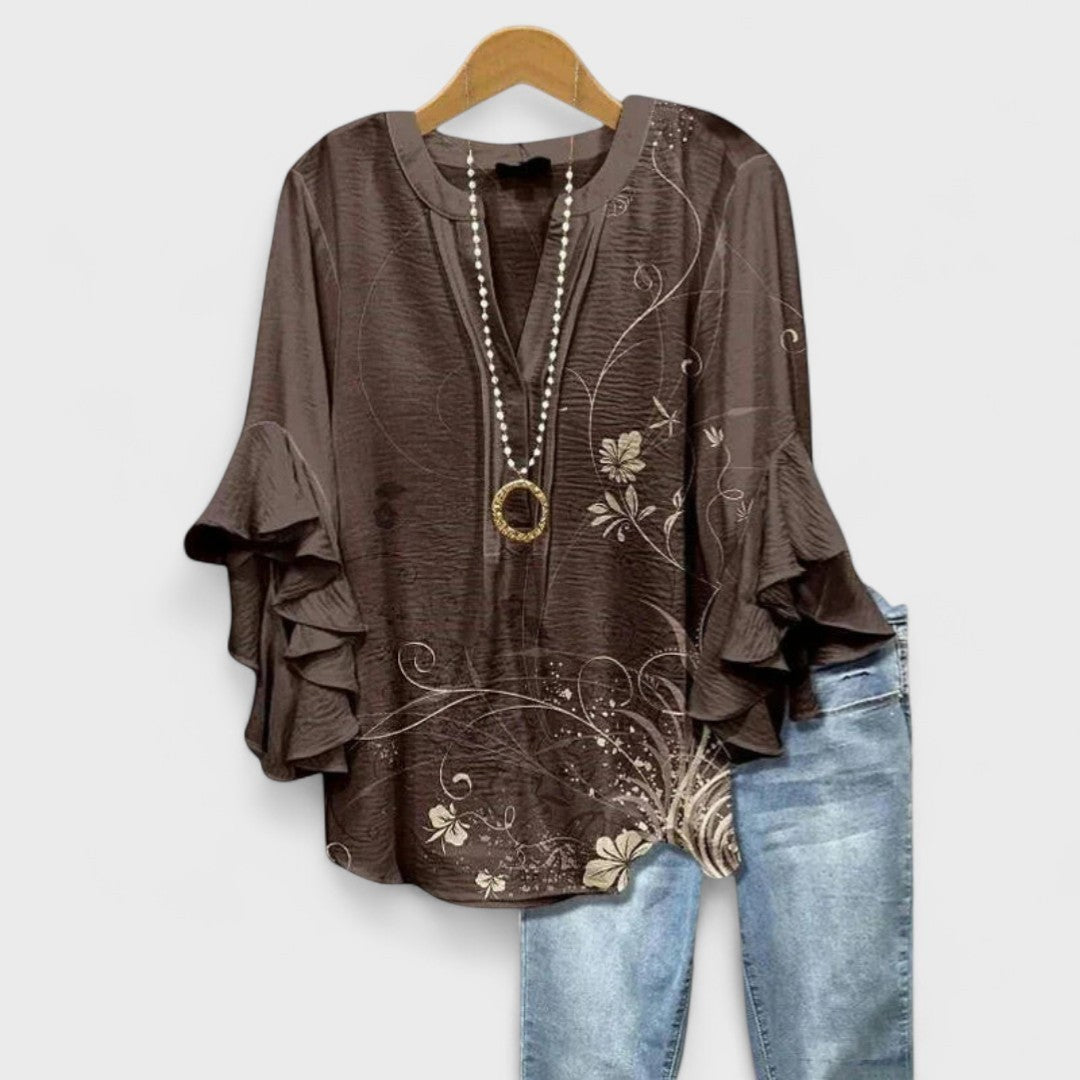Brown floral print blouse with tiered ruffle sleeves and V-neck