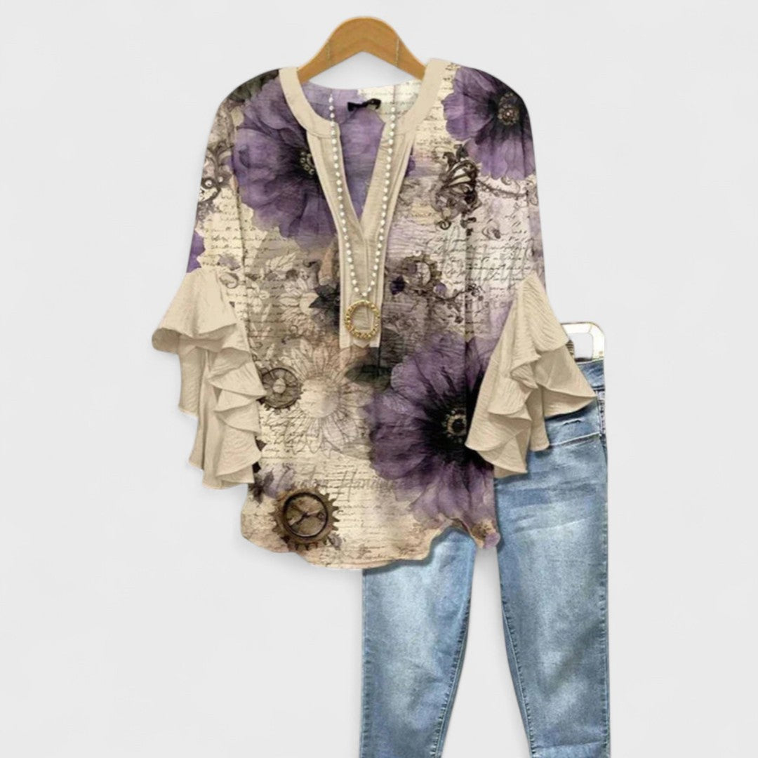 Ivory blouse with purple floral print and tiered ruffle sleeves