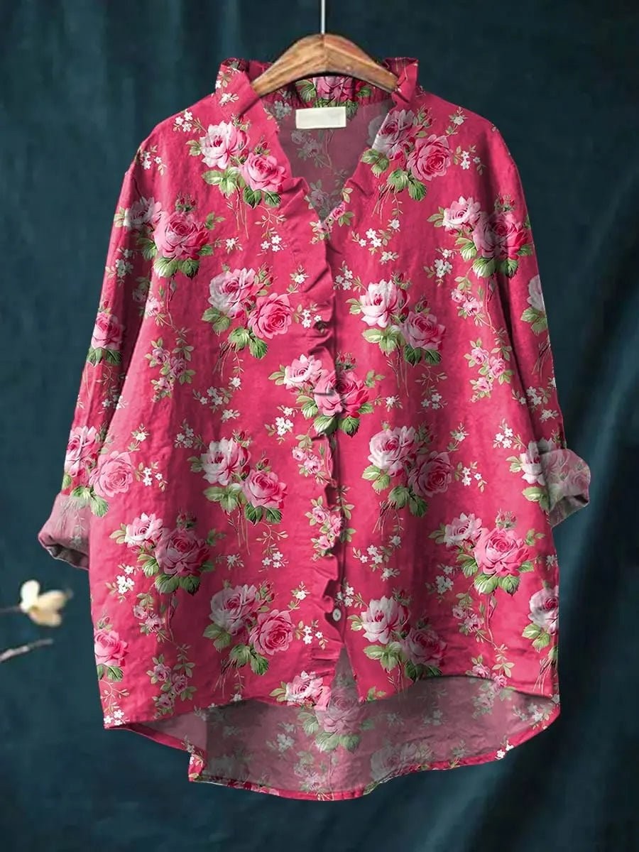Red floral button-down blouse with ruffled collar and long sleeves