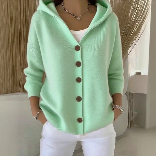 Mint green hooded cardigan with ribbed knit texture and button front