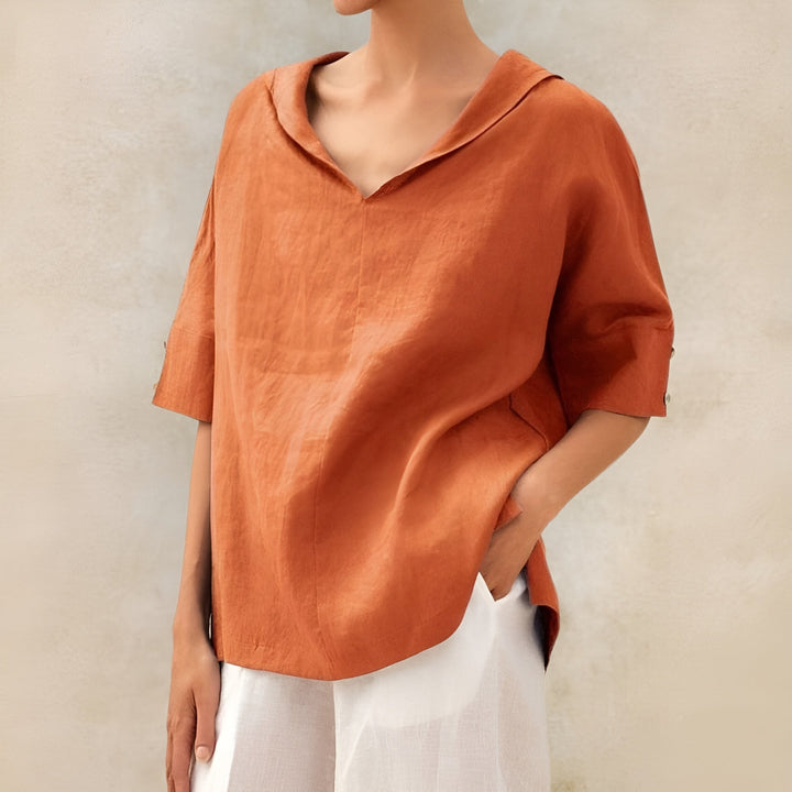 Rust orange linen blouse with collared V-neck and half sleeves