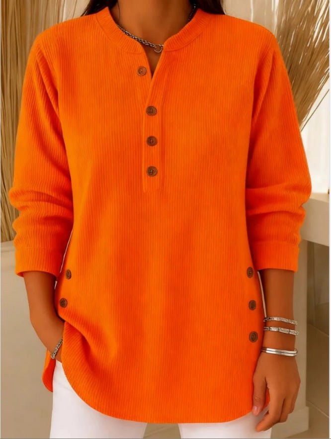 Orange ribbed henley tunic top with buttoned neckline and relaxed fit