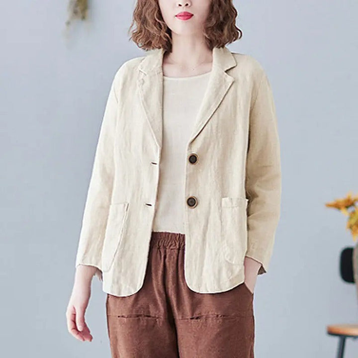 Cream linen blazer with tortoiseshell buttons and lightweight tailored cut