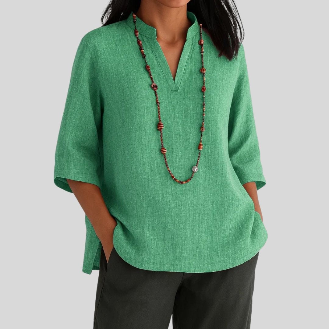 Green linen tunic with notch V-neck and relaxed 3/4 sleeves