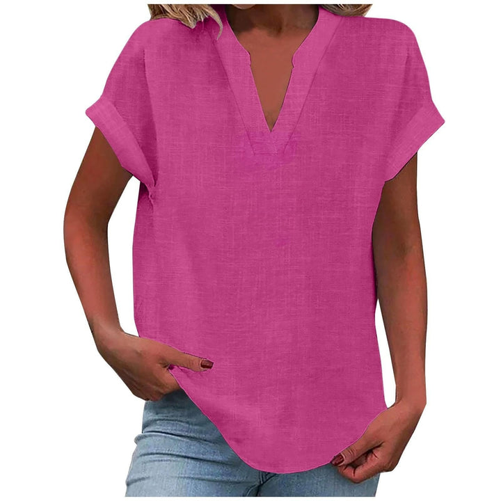 Hot pink split V-neck top with cuffed short sleeves and flowy cut