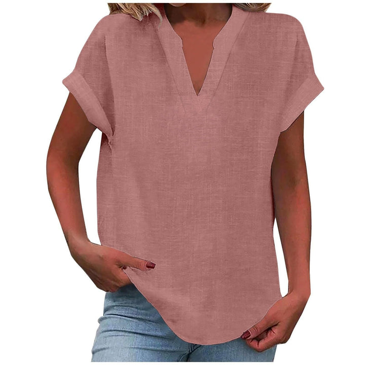 Dusty pink split V-neck blouse featuring cuffed short sleeves and linen texture