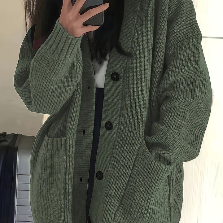 Olive green ribbed knit cardigan close-up with button-front detail