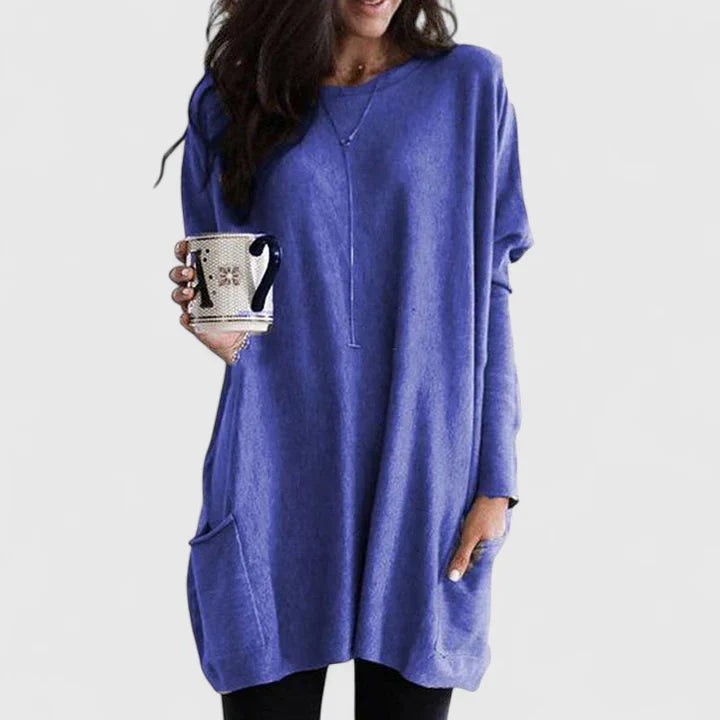 Periwinkle blue long-sleeve tunic top with round neckline and pocket