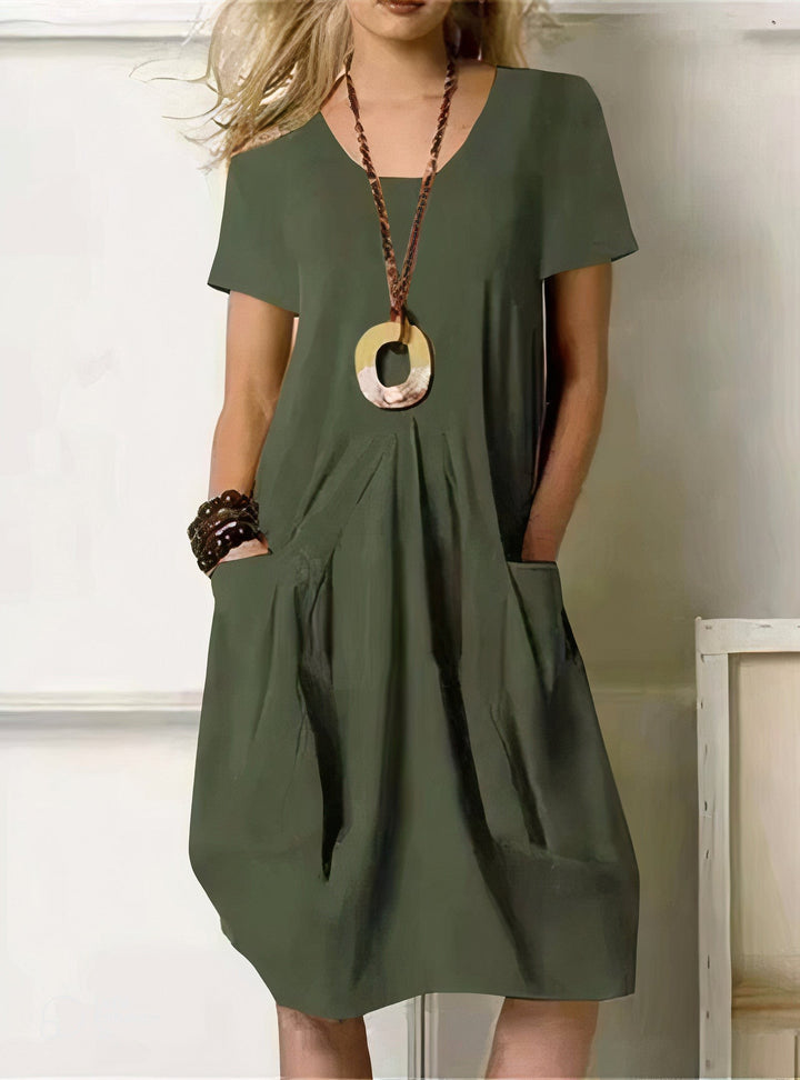 olive green short-sleeve shift dress with front pockets and V-neck