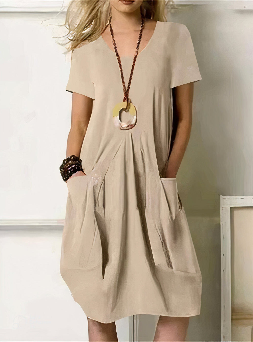 beige short-sleeve shift dress with front pockets and V-neck