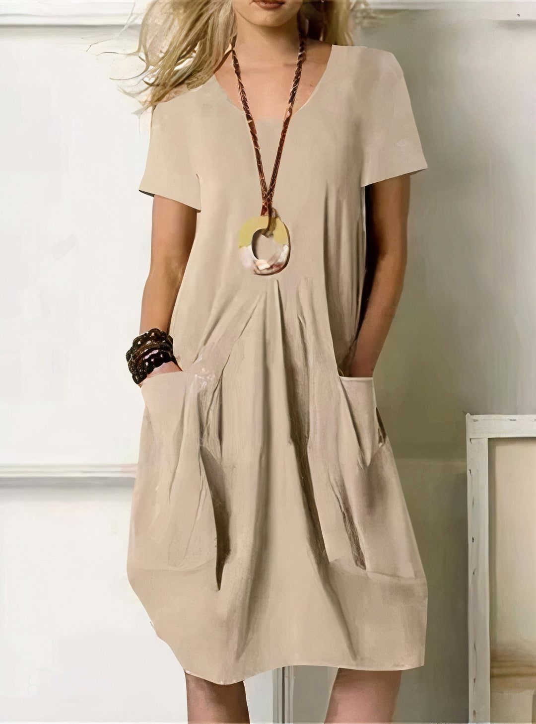 beige short-sleeve shift dress with front pockets and V-neck