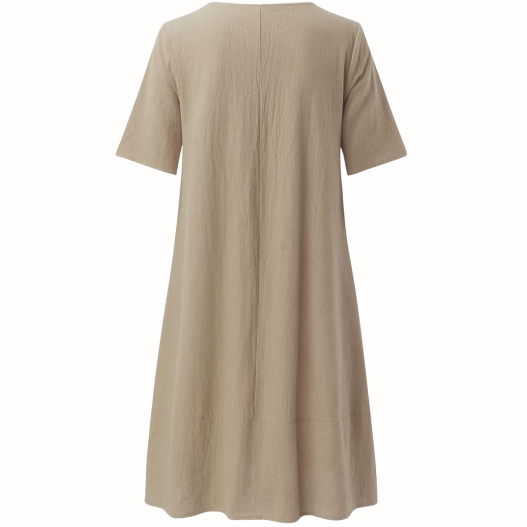 back view of taupe short-sleeve midi dress with A-line silhouette