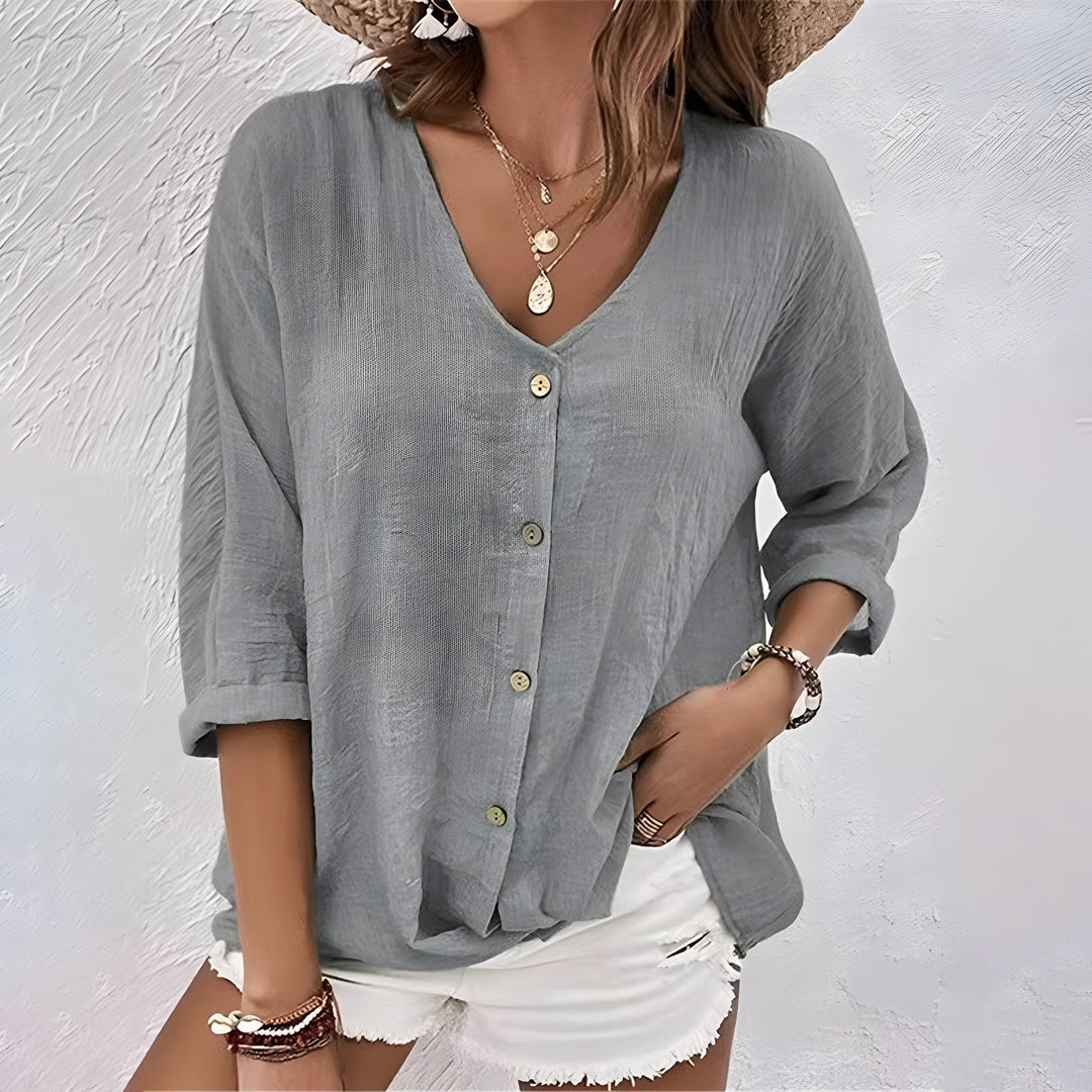 Charcoal gray relaxed blouse with button front and cuffed sleeves