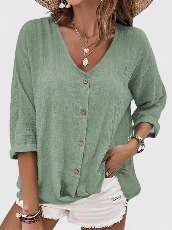 Sage green linen button-down top with V-neck and oversized fit